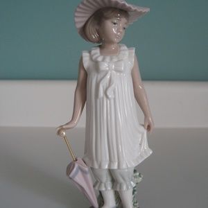 Nao by Lladro "April Showers" figurine